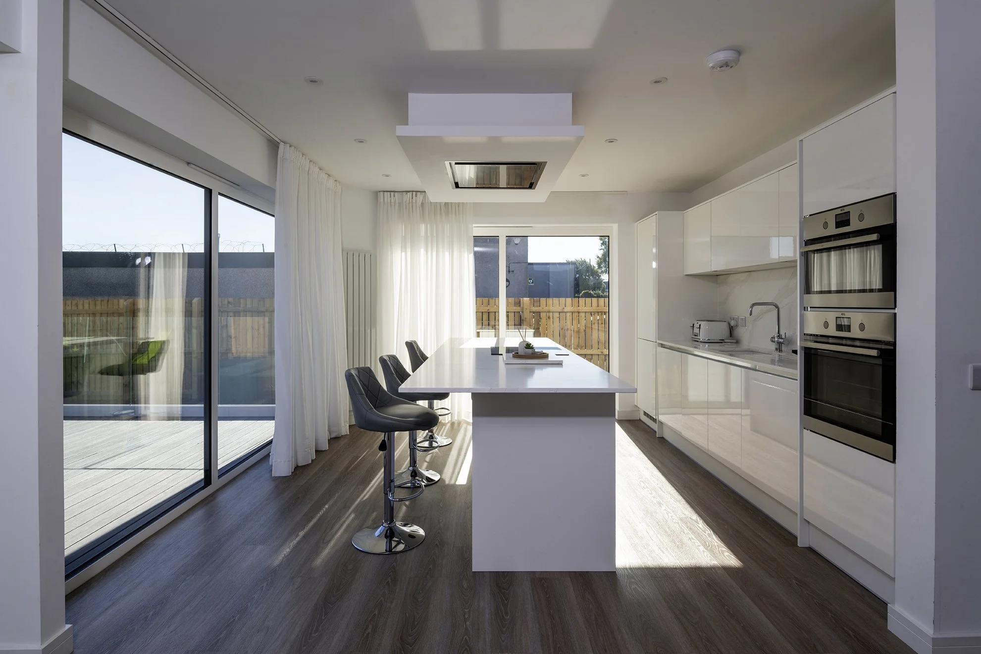 The kitchen opens onto the terrace and has a large south facing window.