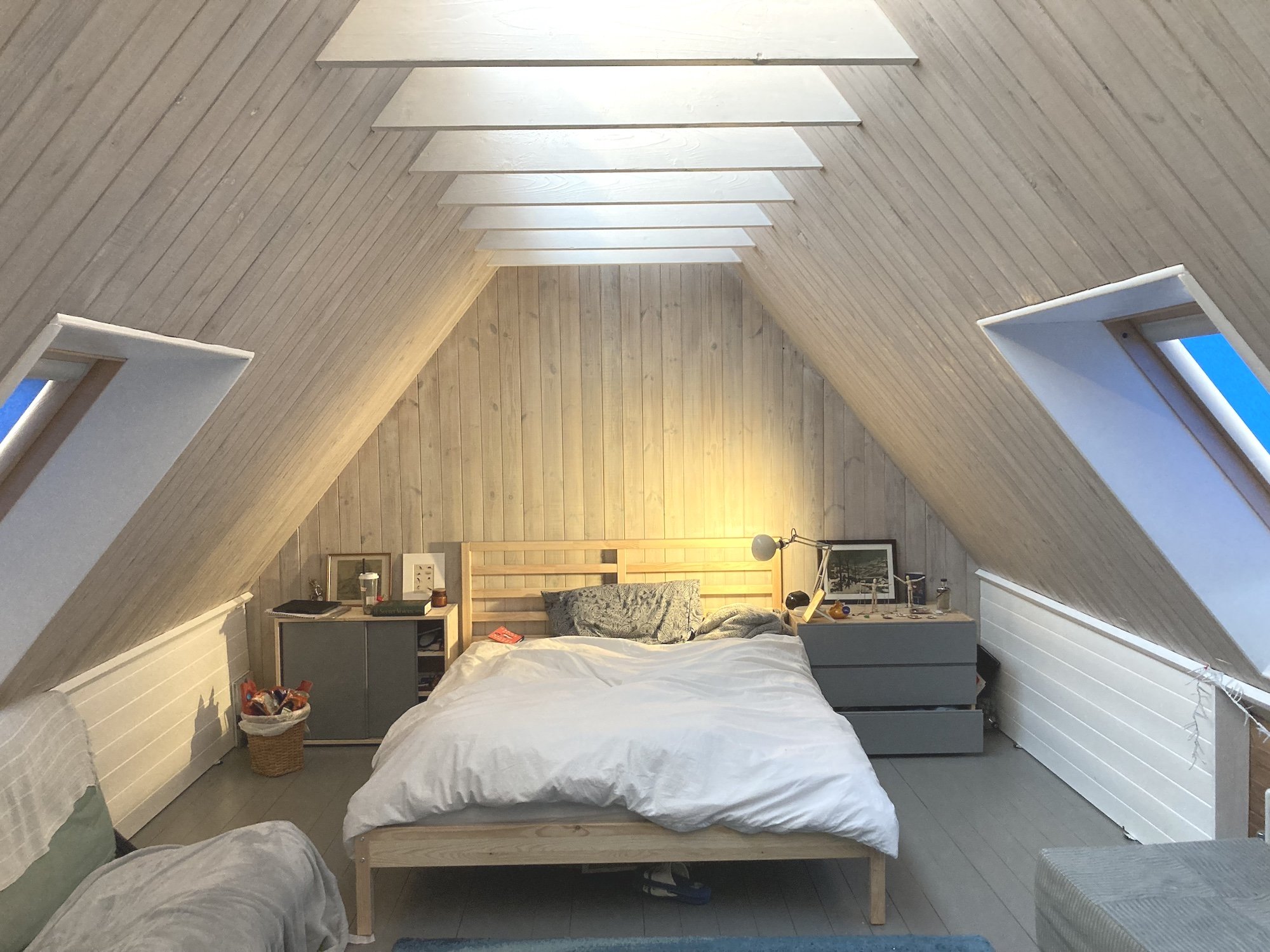 Attic bedroom. A ridge roof light brings in good quantities of light, while the roof windows give views and ventilation.