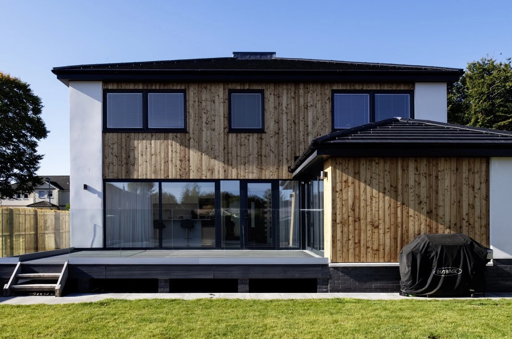 The rear elevation is more informal again, opening on to the private rear garden.