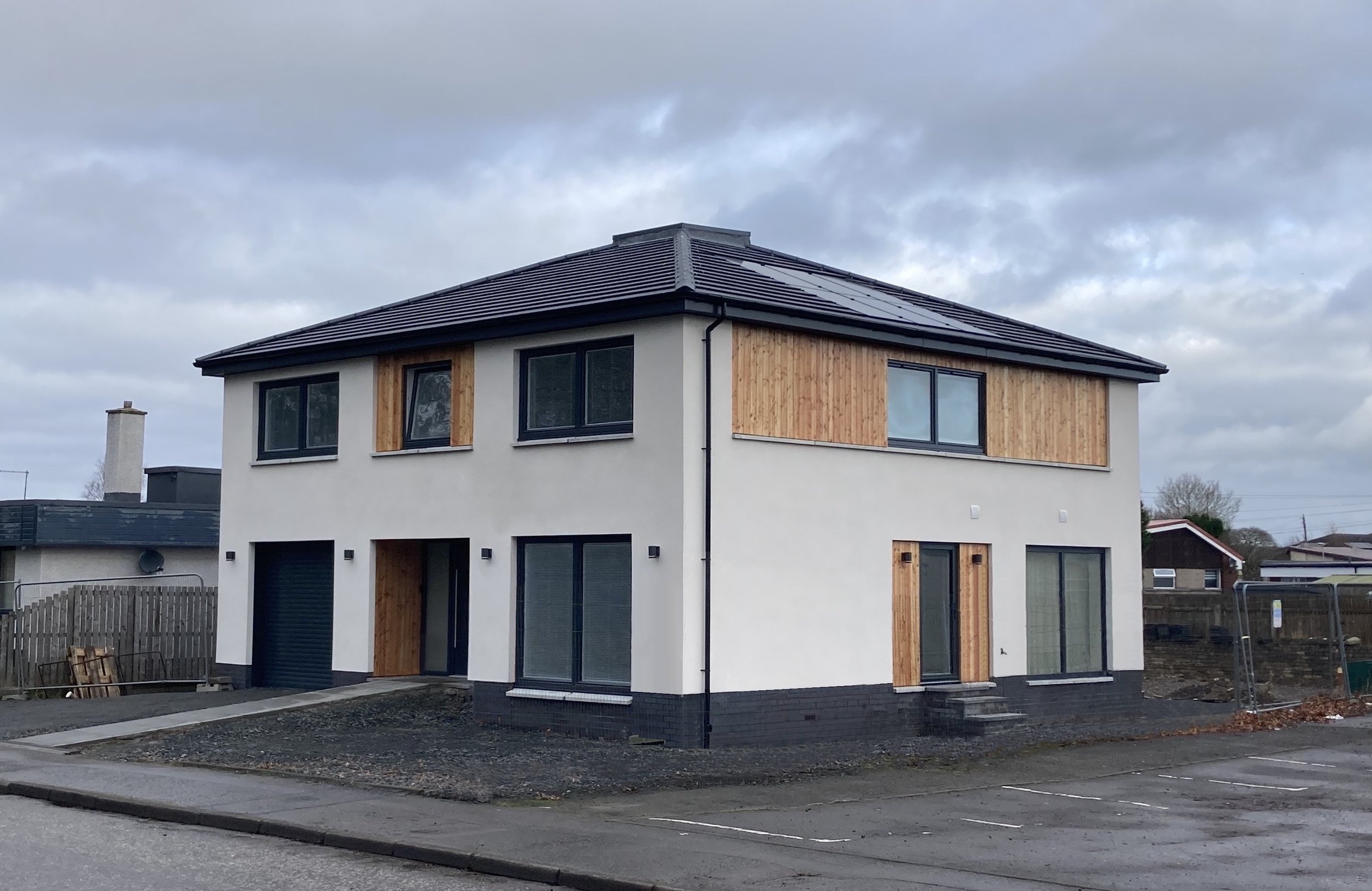 The organisation of the facades is more informal to the side and rear of the house.