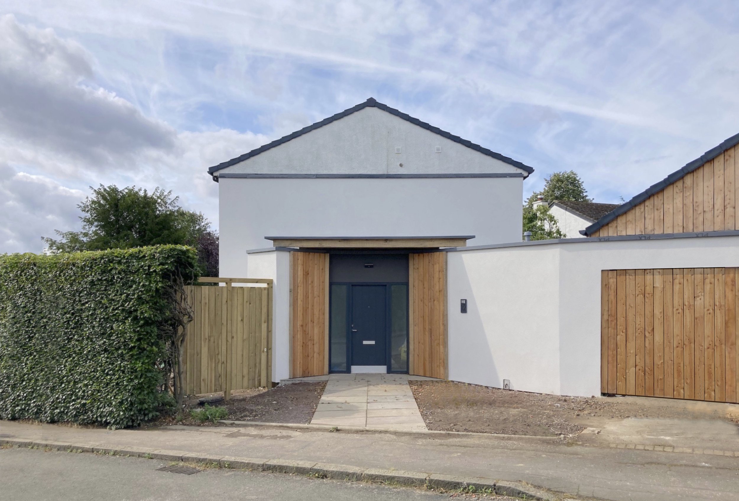 A new entrance to the east gable uses symmetry to emphasise the front door.