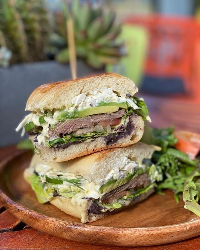 Carne Asada torta!! 🙌🏽 Marinated grilled skirt steak, avocado, black bean spread, lettuce, tomato &amp; pickled jalape&ntilde;os on a roll 😋 get it with a Watermelon Marg for extra deliciousness 🍉🥑🌶✨ #shoplocal #supportsmallbusiness #delicious 