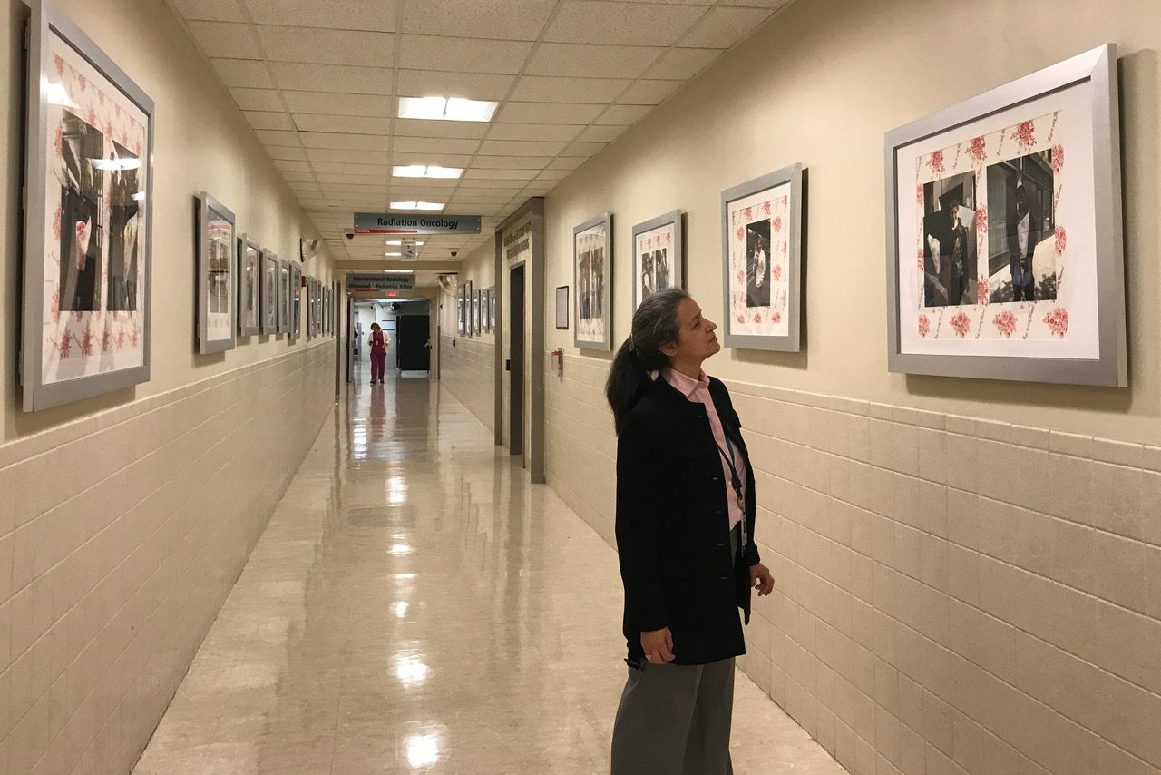 Curator Jodi Moise at "Say it with Flowers" the ARTViews Gallery Fall exhibition featuring the work of artist Linda Stillman.