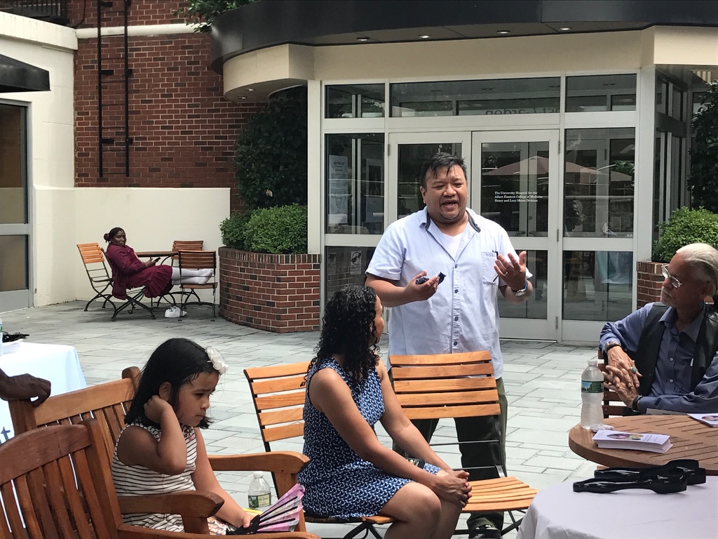 Creator of the Bronx Salad, Chef King Phojanakong, speaking at the Community Enrichment Day.