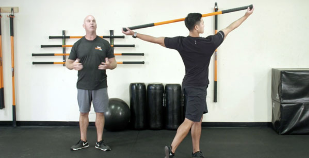 Ben Shear Teaching Stretches With Mobility Stick