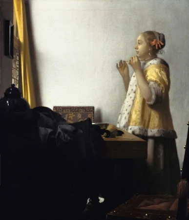 Woman with a Pearl Necklace by Johannes Vermeer. (Little tidbit here, but I did a watercolor rendition of this painting while in art school. It's currently hanging in my guest bathroom.)