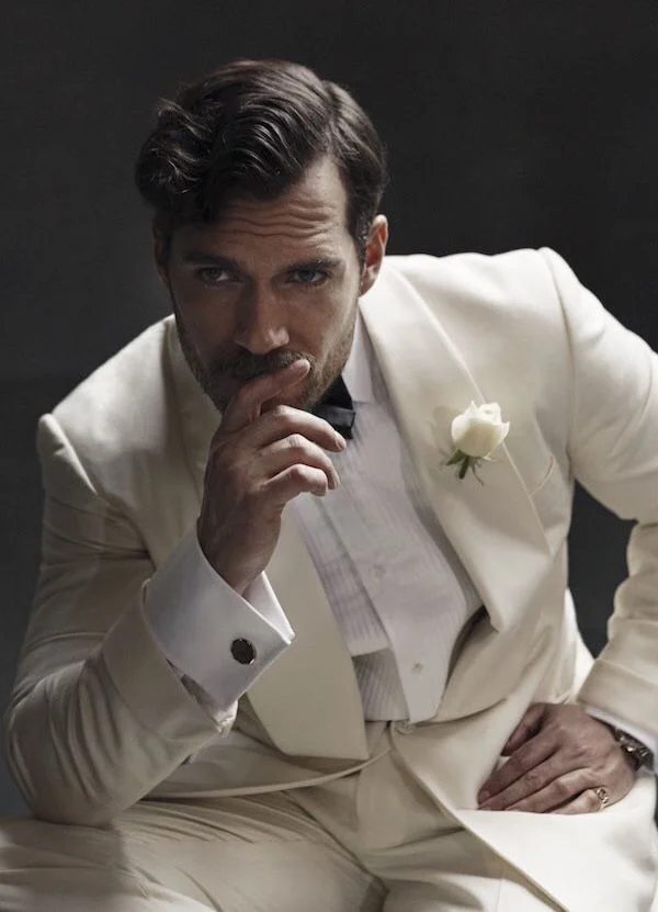 He's pointing to his much touted tickler right there. 