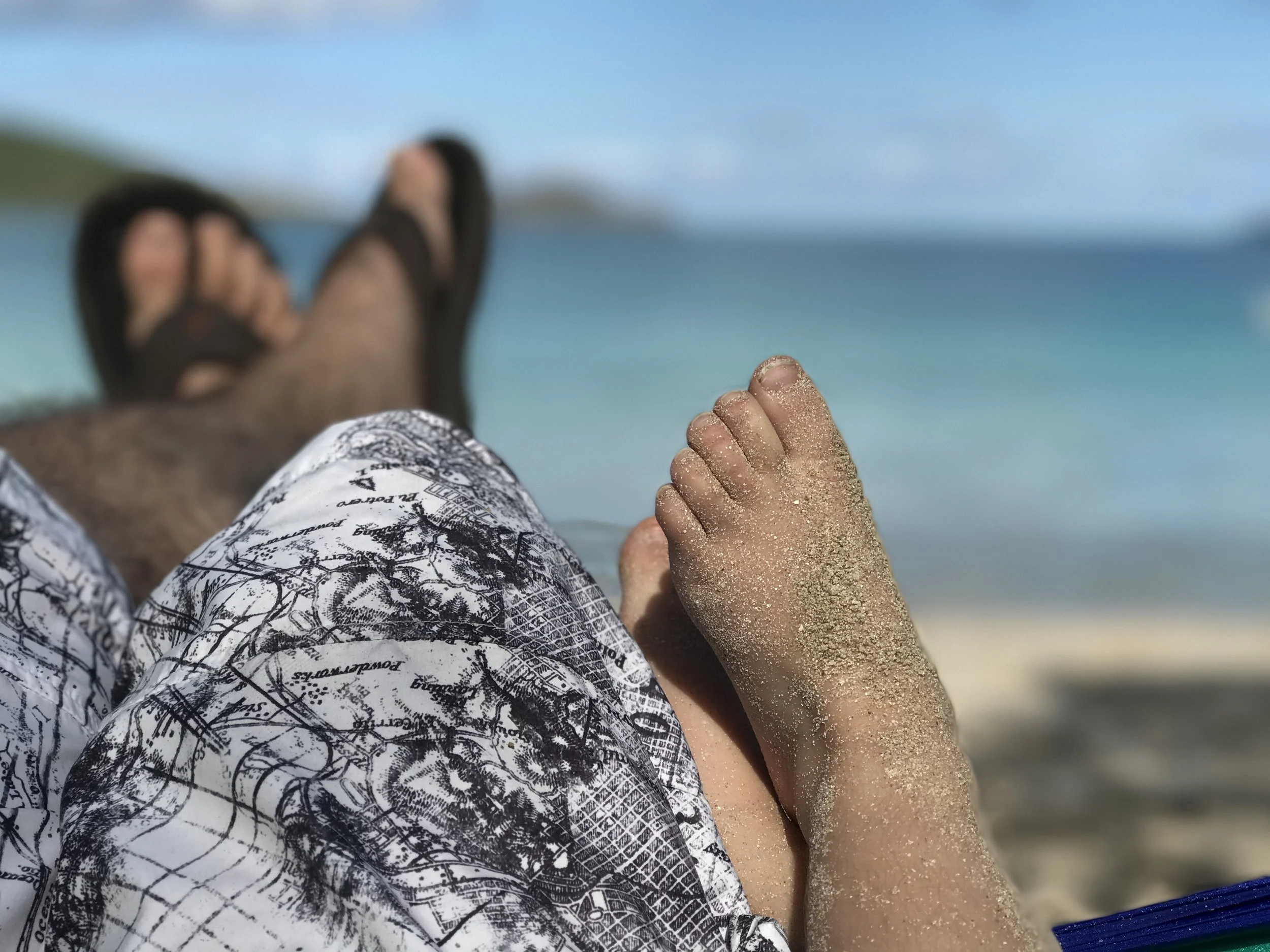 Daddy and Ella, hammock days with sandy feet.
