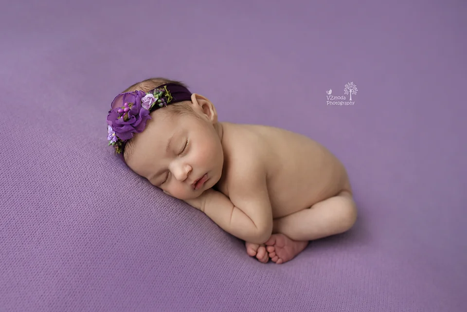 newborn taco pose