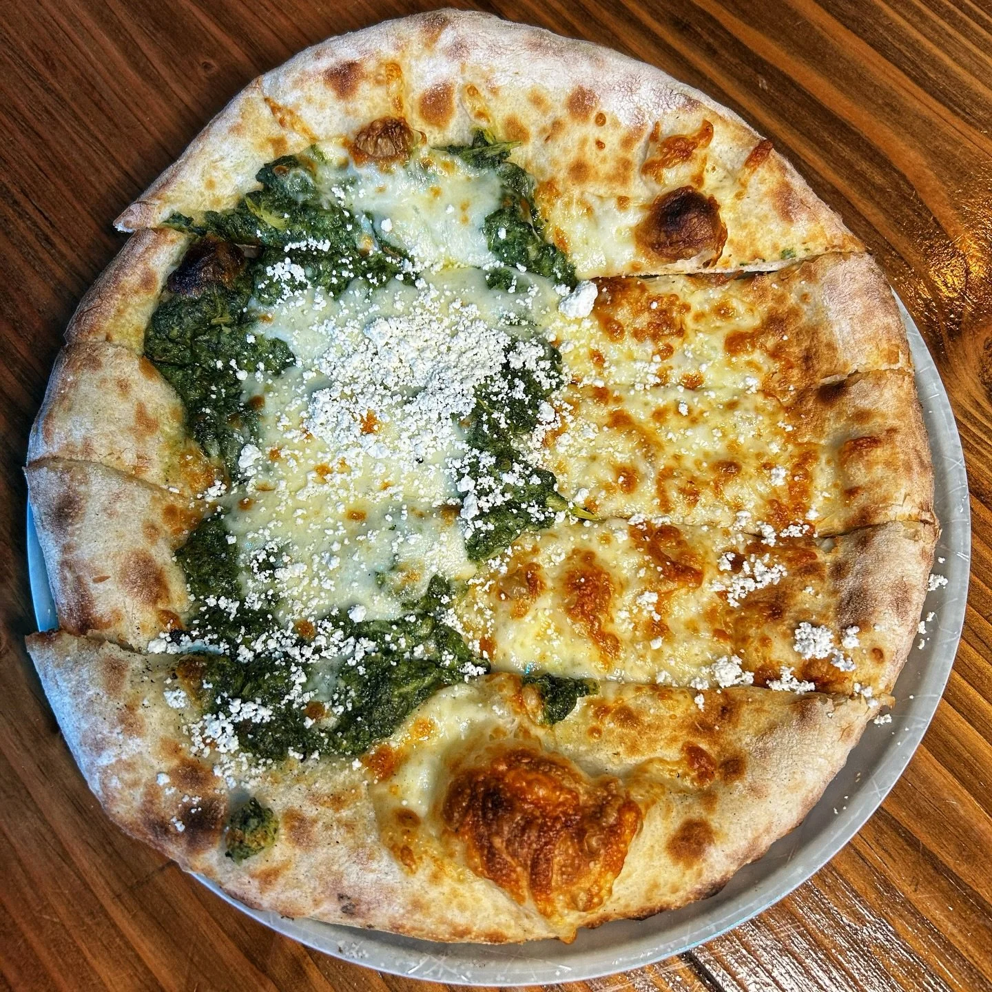 Introducing your new favorite shareable treat, the Beachcrest Spinach Artichoke Dip.

Our culinary team crafted a delicious spinach artichoke dip that is baked onto our house made sourdough crust. 

Grab a slice, fold it and enjoy the perfect balance