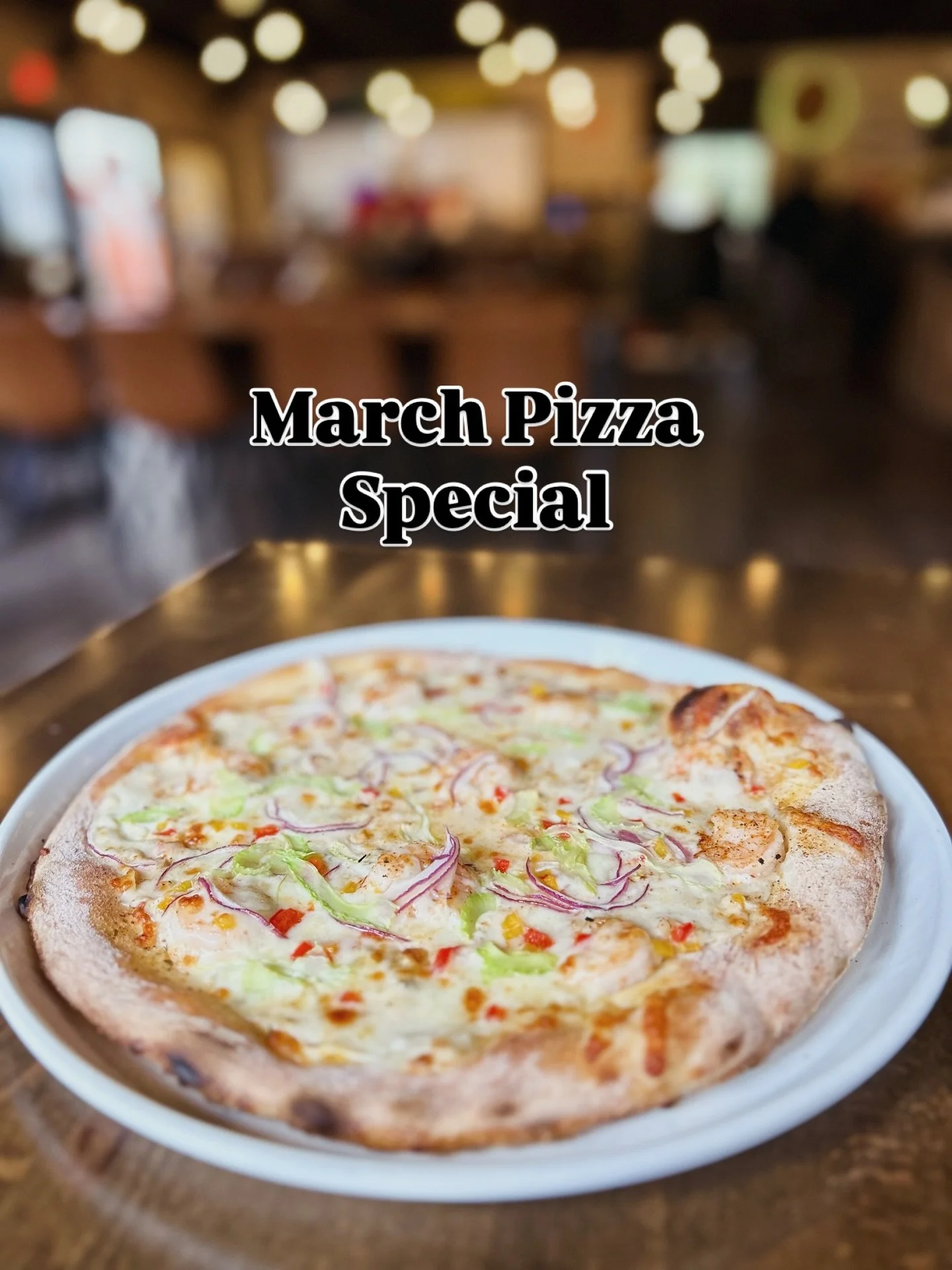 Introducing your new favorite craveable pizza: Cajun Shrimp Alfredo 

House made sourdough crust topped with white sauce, garlic Shrimp, cajun seasoning, trinity vegetables (onion, bell pepper, and celery), and mozzarella blend. 

The March feature C