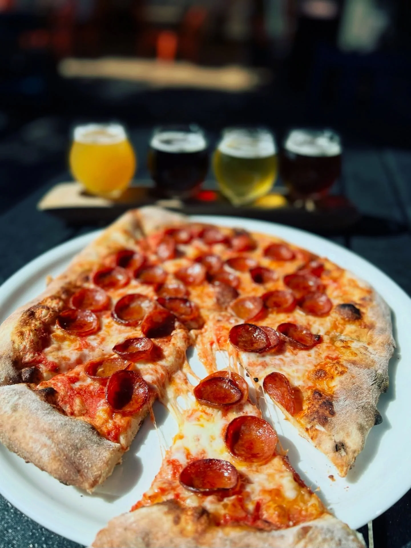 This is your sign that it&rsquo;s time for pizza and beer. 

Pepperoni pizza and a beer flight, the perfect winning combo.