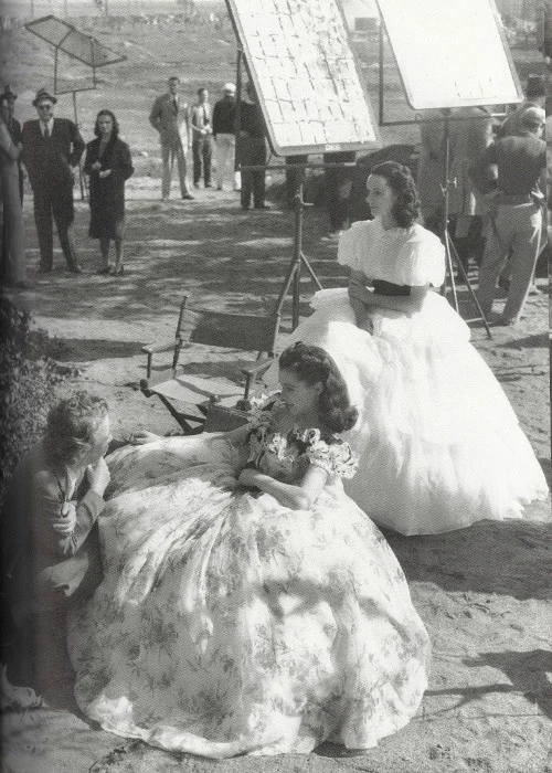 In her book, Gone With the Wind (1937), Margaret Mitchell characterized Scarlett O'Hara's eyes as being green. Director, David O. Selznick, was obsessed with this detail and insisted that Vivien Leigh's hazel eyes appear green. Monte worked with the wardrobe department and arranged for the actress to wear shades that could reflect in her hazel eyes. He used hues of green eyeshadow when making her up and Selznick never figured out how he miraculously turned her eyes green.