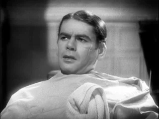 Actor, Paul Muni, Scarface (1932), seen here with his sinister scar created by Monte. This scar would become a trend in gangster films of the 1930's and beyond.