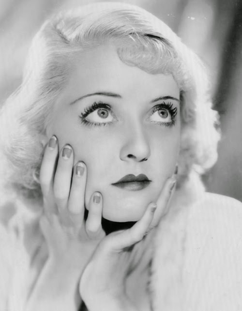 Bette Davis, bee stung lip.
