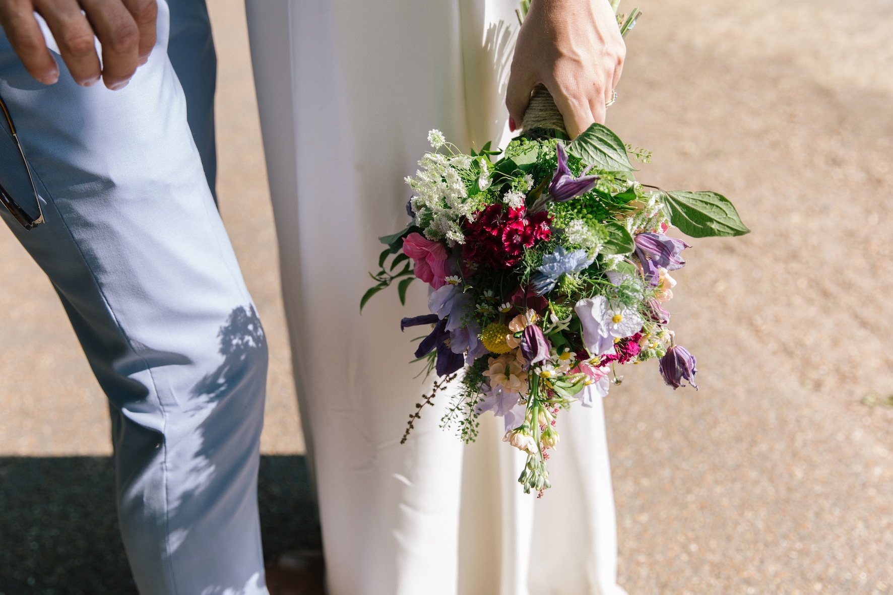 Natural, seasonal and colourful wedding flowers with a ‘just picked’ look. Ashley and Adam Photographer - Katie Palmer Photography Venue - Mile End Art Pavilion, London