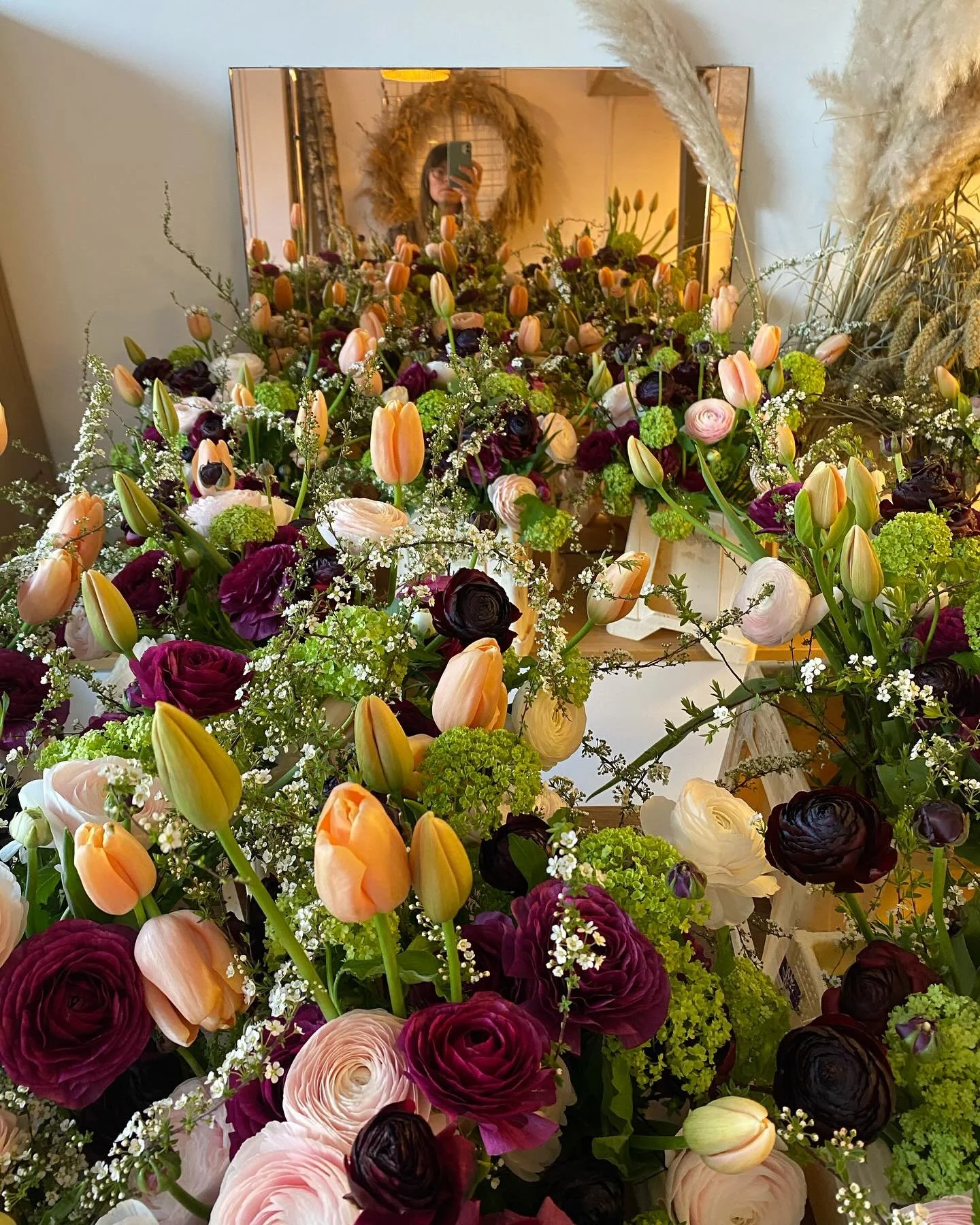 Studio scenes for @wearehoopla this week. Bouquet after bouquet filled with the most beautiful Cloony Ranunculus. #loveblooms #clareloveblooms