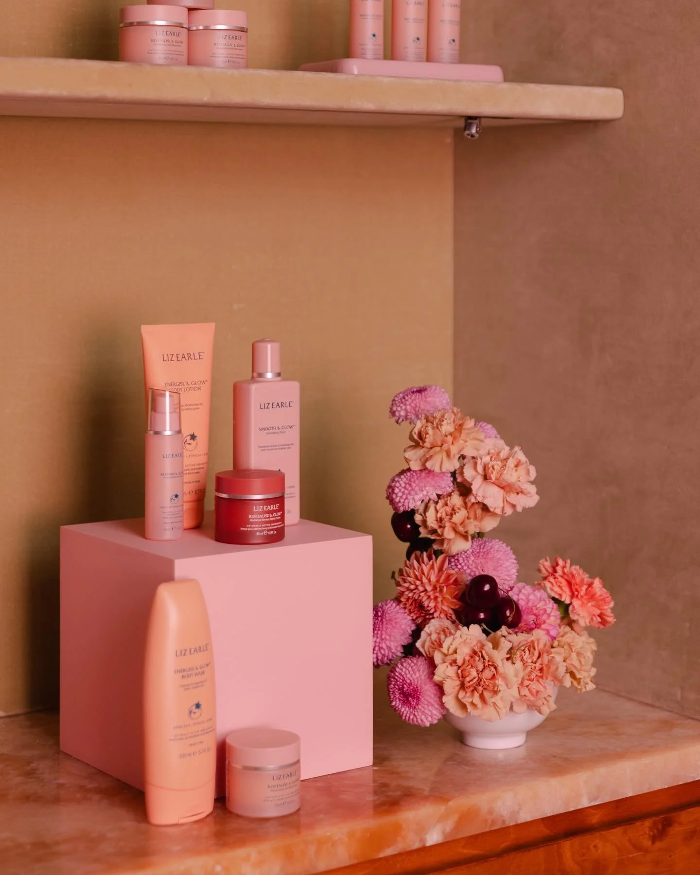Adored creating these sculptural arrangements, layers of Dahlias, Carnations, Chrysanth blooms and cherries for @heaps_stacks for @lizearlebeautyco Soft Summer Glow campaign at the iconic @shreejinews #clareloveblooms