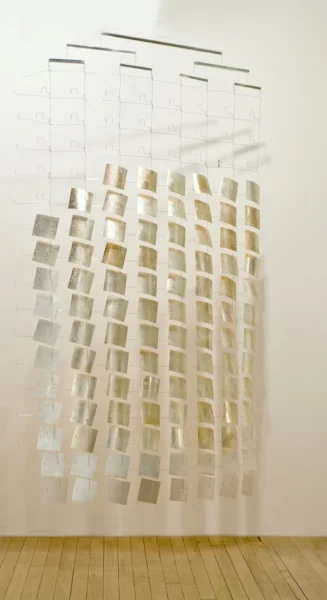 Sunlit Afternoon : silver leaf on DuraLar squares, aluminum structure : this rotates with ambient air movement. It needs a column of air with a diameter of around 8'.
