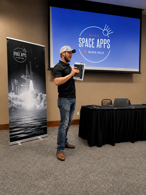 Travis Davis speaking at NASA Space Apps Black Hills.