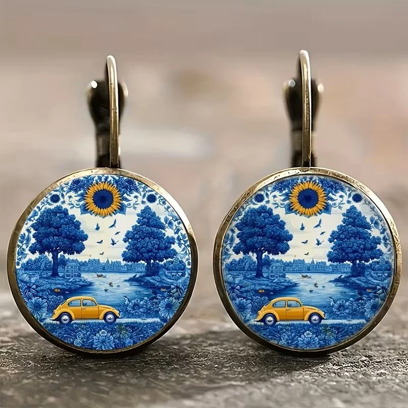 Round Yellow Bug Blue background earrings.jpg