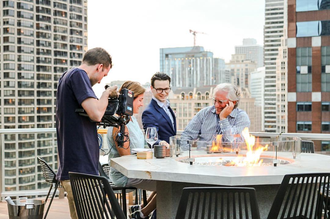 Laurence Geller (far right) at Noyane, the rooftop restaurant at Conrad Chicago. Photo by Victoria Kent.