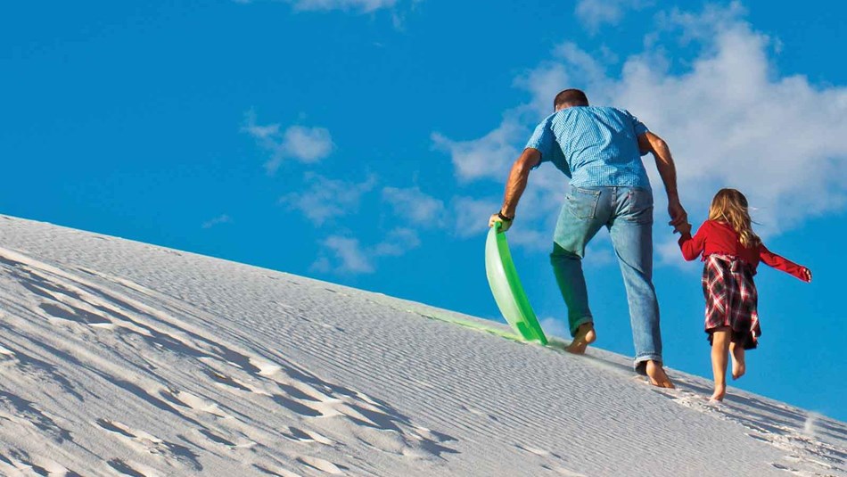 Do you want to get out and explore? At White Sands National Monument there are many activities to choose from including sledding and hiking.