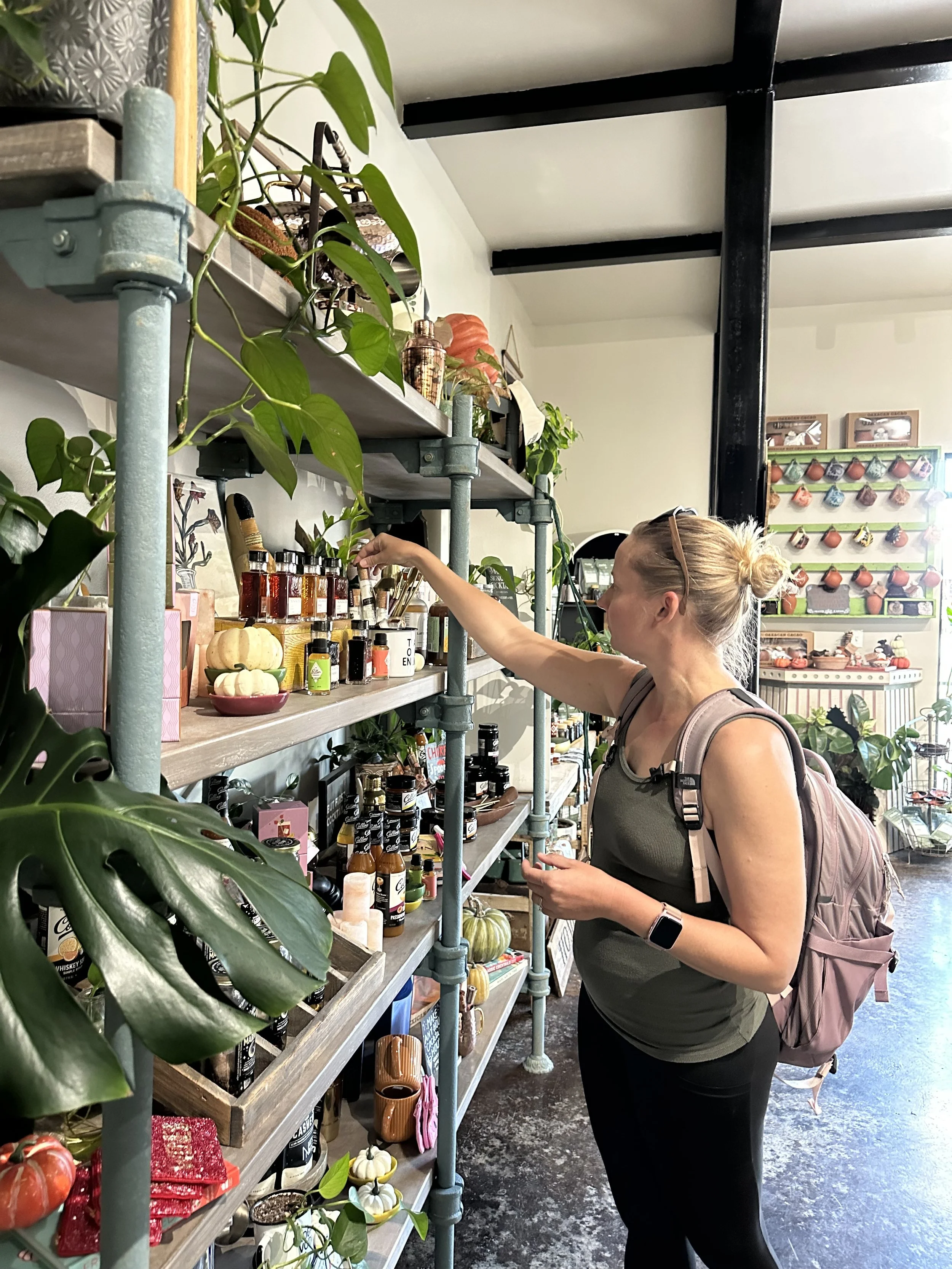  Shopper browsing plants and gifts at a local Ruidoso boutique 