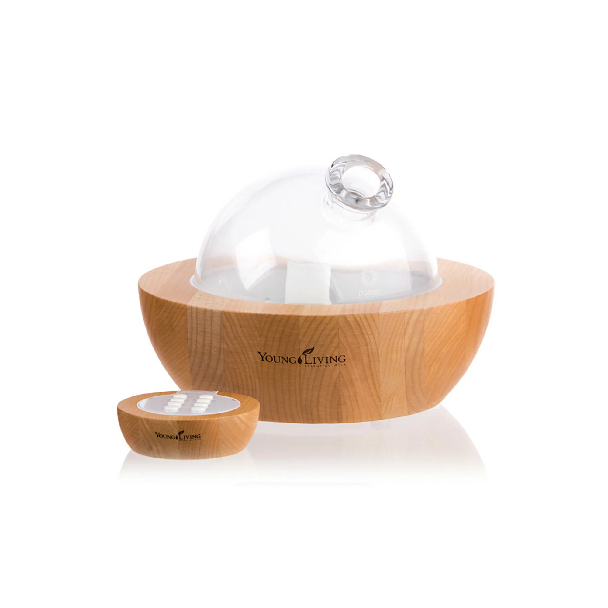 ARIA ULTRASONIC DIFFUSER This diffuser is a treat to have in your home! The remote lets you choose from a selection of soothing, built-in sounds, run time, or enjoy the multicolored LED lights. With the built-in speakers, you can plug in your own personal music device and enjoy the music of your choice. Comes with a 5ml bottle of Tangerine and Peppermint essential oils. Click here to learn more about this product.
