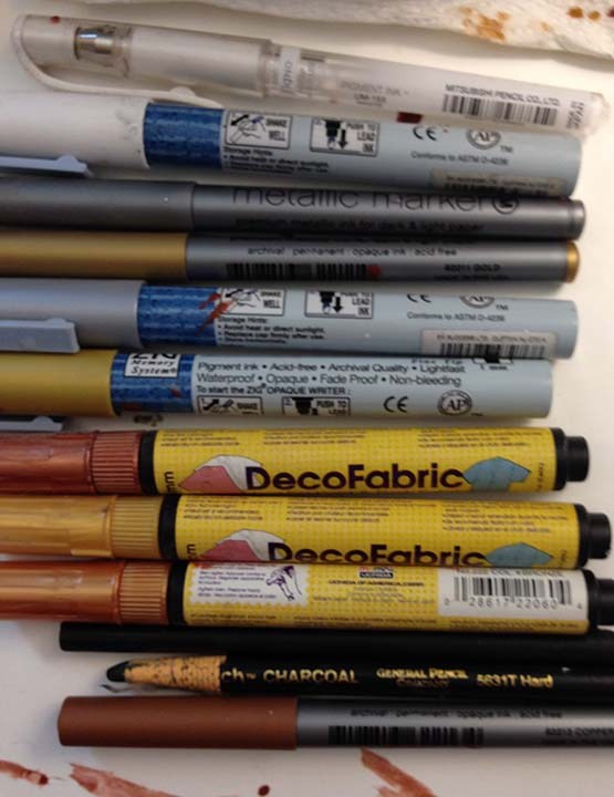 Metallica and opaque markers and pens.