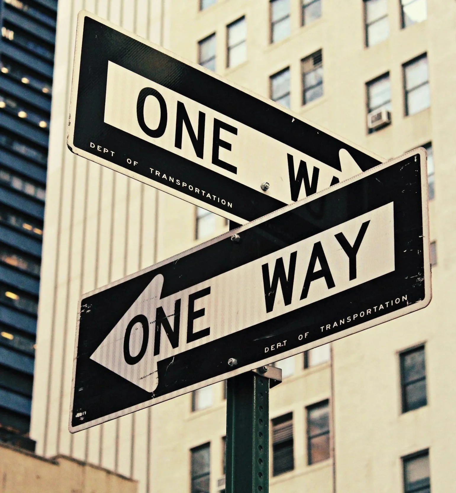 One way signs pointing two ways