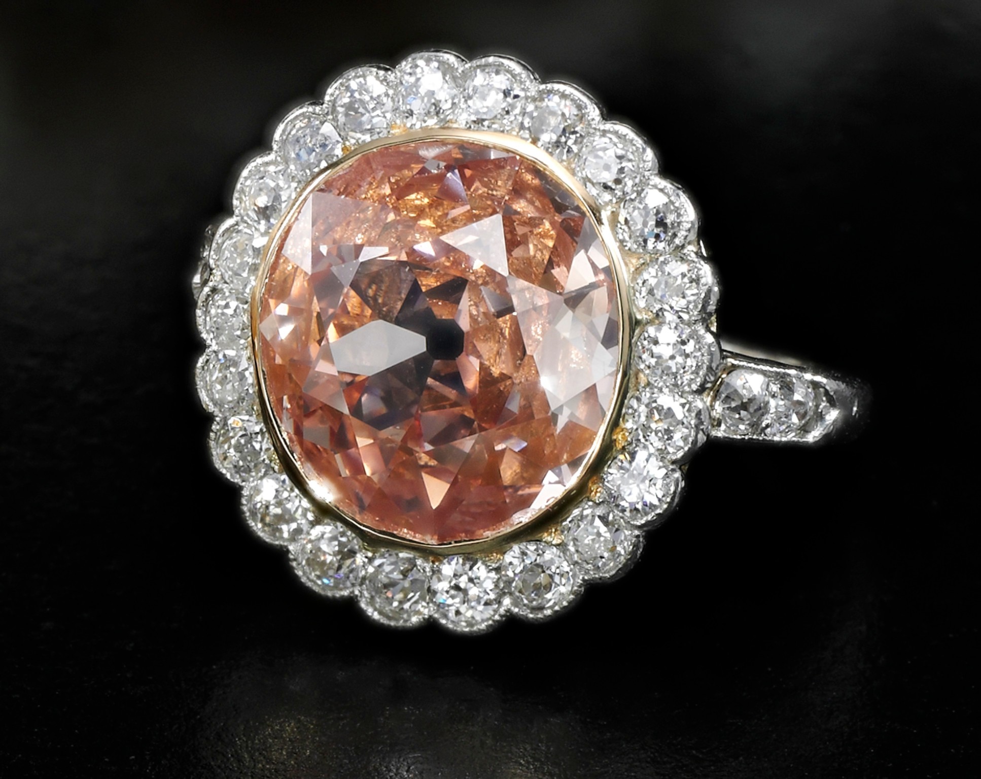 Impressive fancy orangy pink diamond ring - on black - Royal Jewels from the Bourbon Parma Family - Sotheby's 14 November 2018.jpg