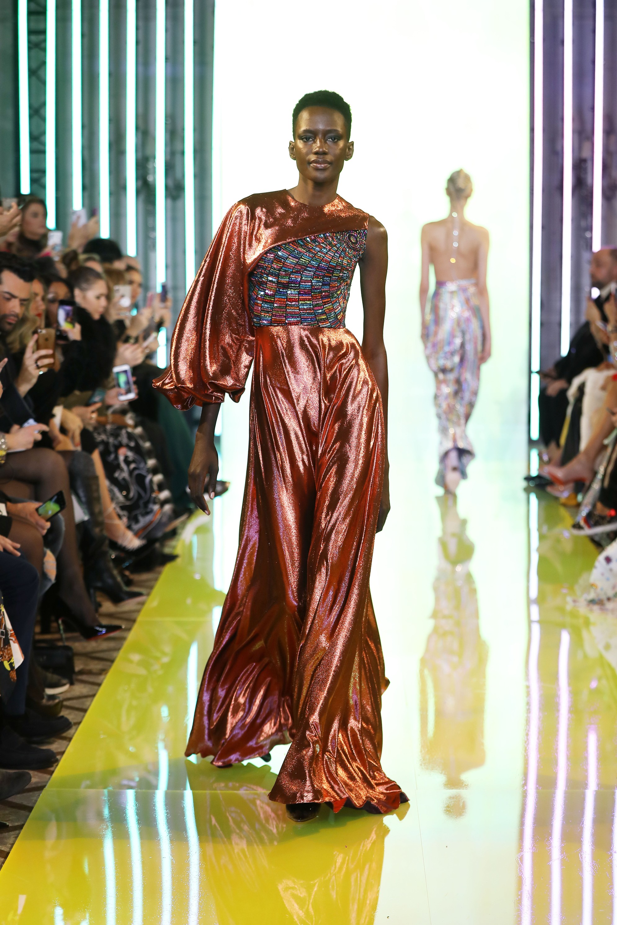 SS19-10 Metallic Orange One Sleeve Lurex Gown Featuring A Bodice Embellished With Colored Glass Beads, Silenes, Swarovski Stones And Sequins .jpg