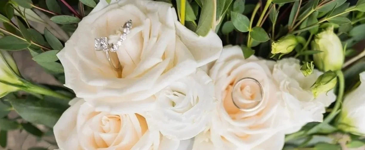 Rings in Flowers at wedding