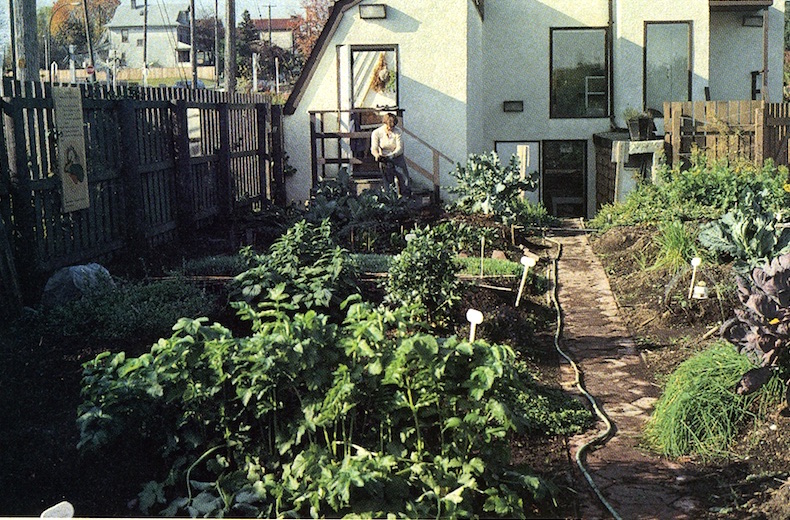 The original office was a solar greenhouse located behind the figure on the steps.