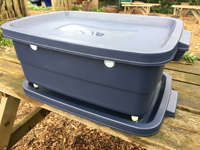 Our new worm bin, with vents and feet, sits on a tray that collects worm 'tea', which is good for feeding your plants.