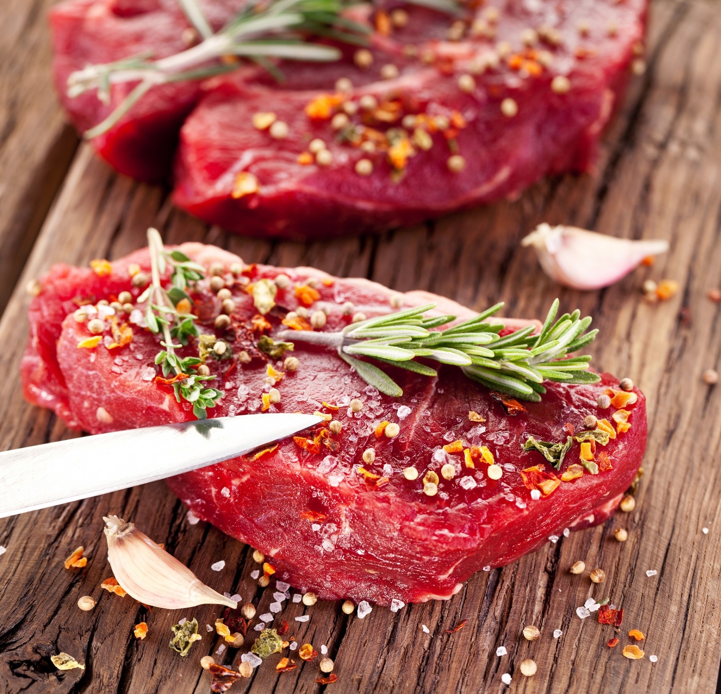 bigstock-Raw-beef-steak-on-a-dark-woode-44856208.jpg