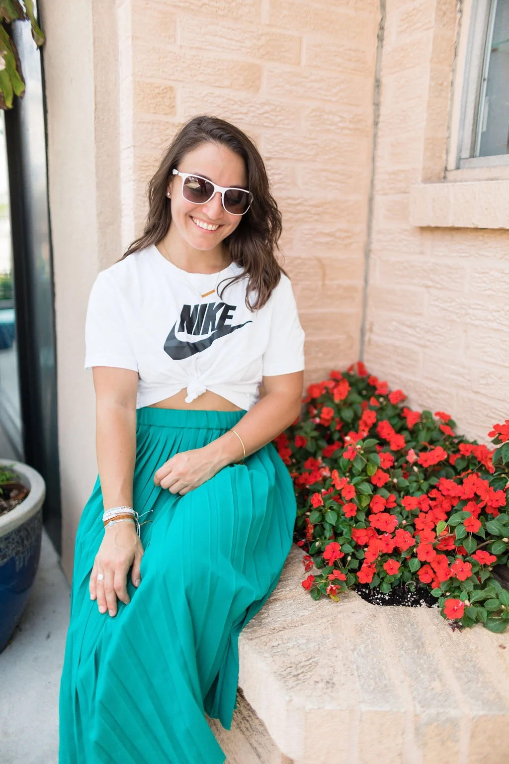 Outfit: Green pleated skirt @bananarepublic @nike crop tee from @dickssportinggoods @rayban sunglasses