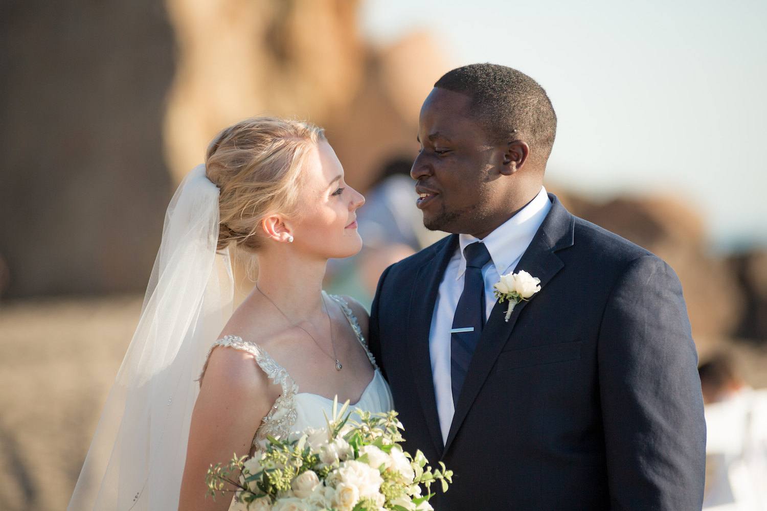 couple at beach elopement ceremony