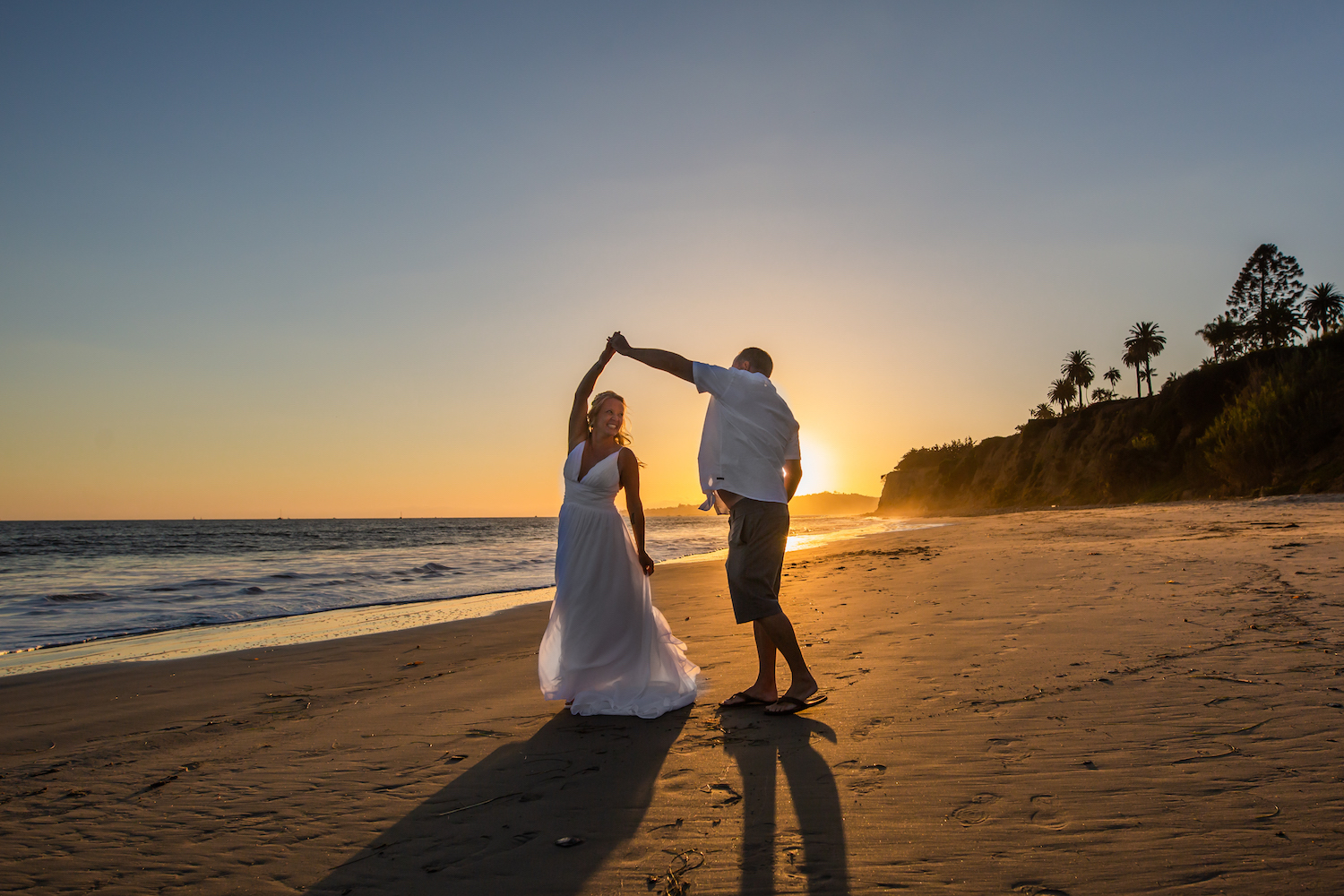 couple dancing on Santa Barbara beach after eloping