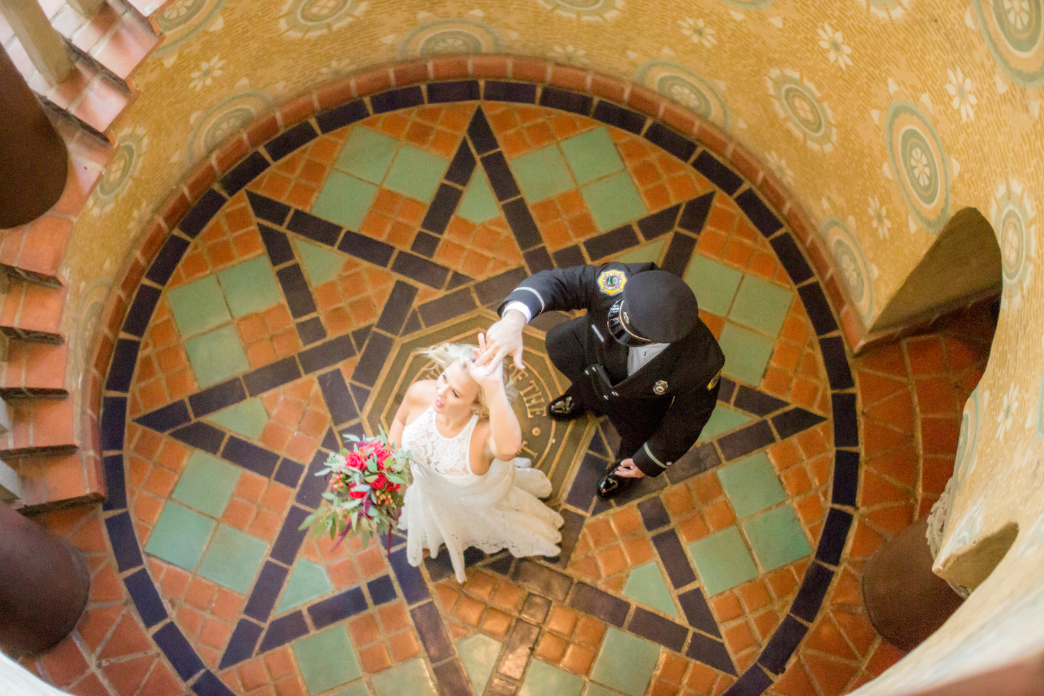 couple dancing on colorful tile at SB courthouse