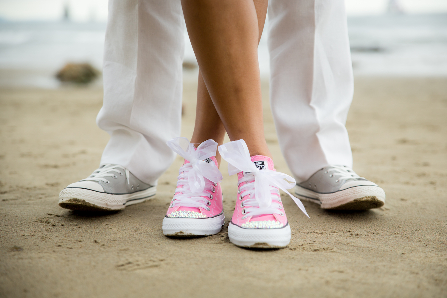 feet-crossed-pink converse.jpg