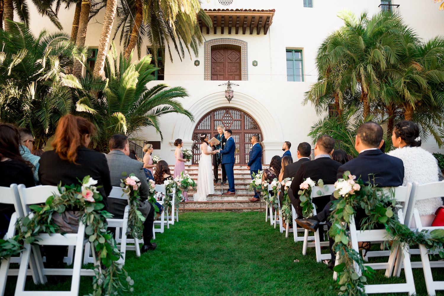 small wedding ceremony on steps of Santa Barbara Courthouse