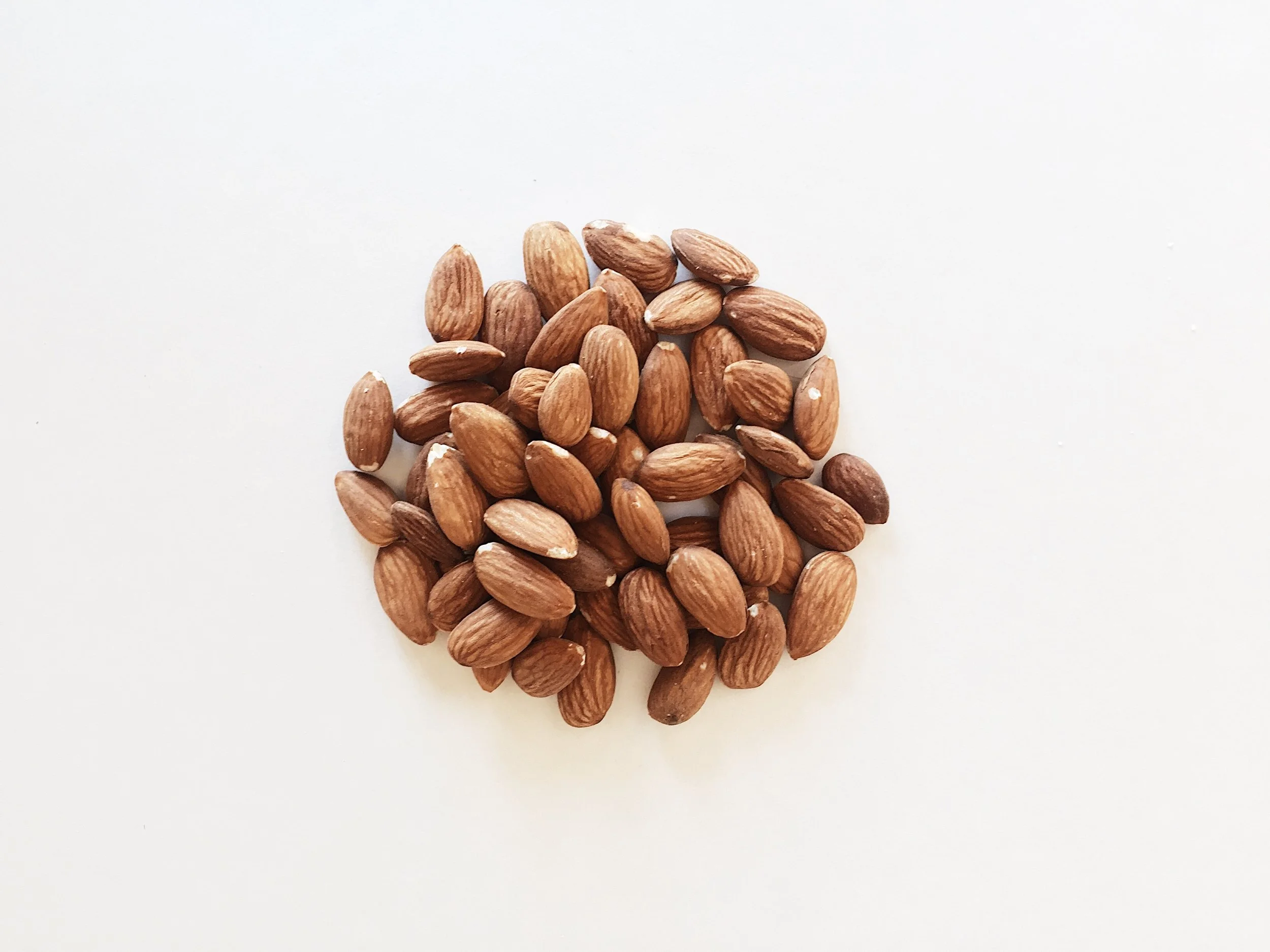 granola-white-background-homemade-honey-oatmeal-cashew-nut-almond-raisin-cranberry-64562688.jpg