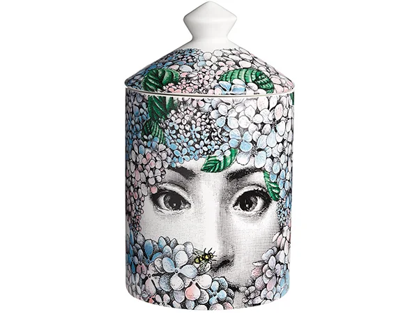 Who else packages your candle in a piece of art? Fornasetti and that’s that! Fornasetti, Ortensia candle £140 www.amara.com 