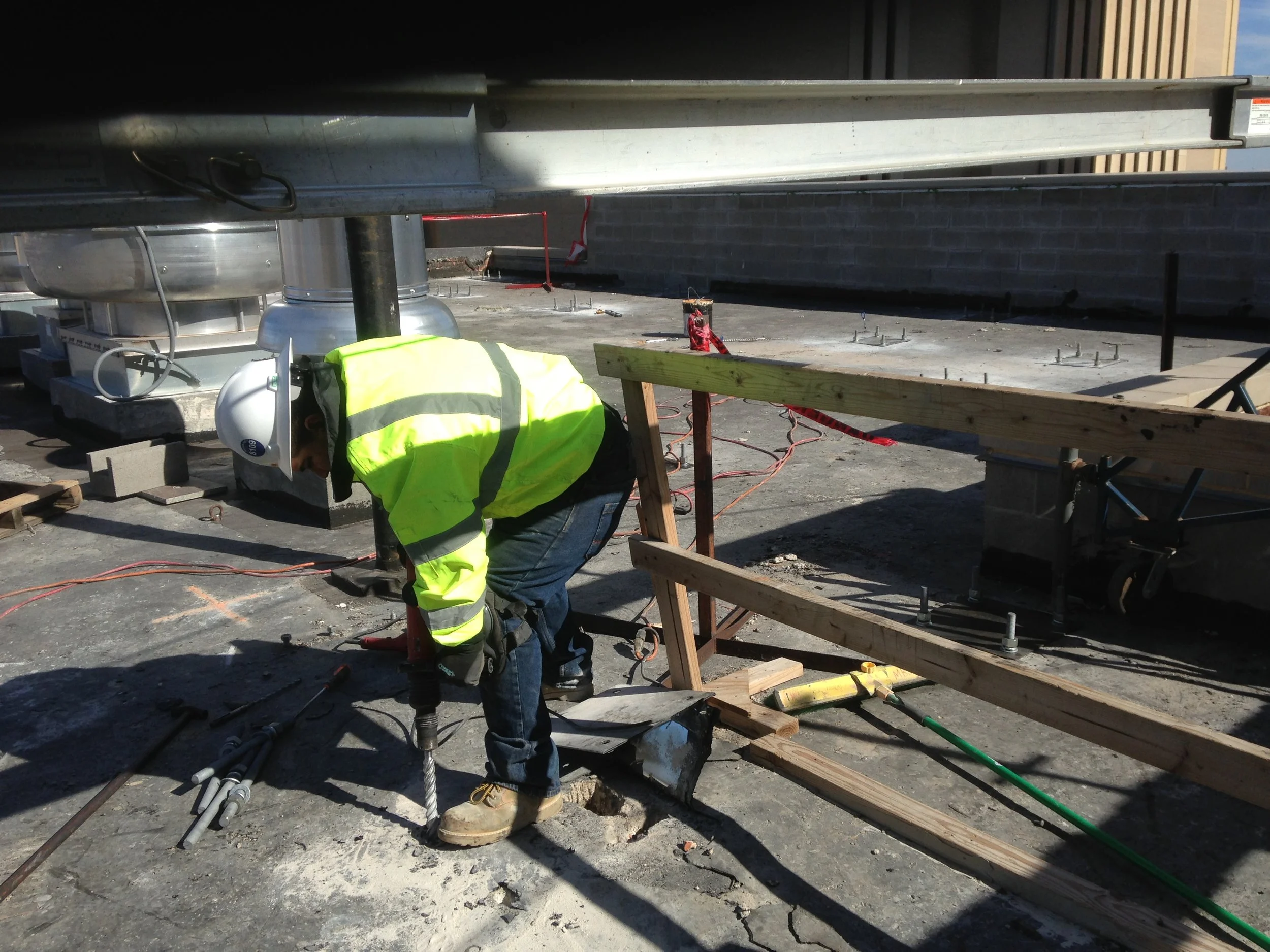 Step 3. B7 treaded rods were installed and cut to length. The underside nuts were tack welded to the rod and to the plate.