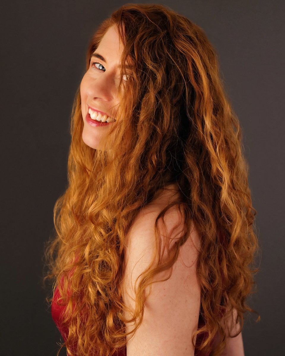 Carolyn: "
Sabrina is fabulous. She was very patient with my anxiety about being unphotogenic, and worked miracles to produce a set of photos I can feel proud of. She also pulled out all the stops to give me a quick turnround, which I really app