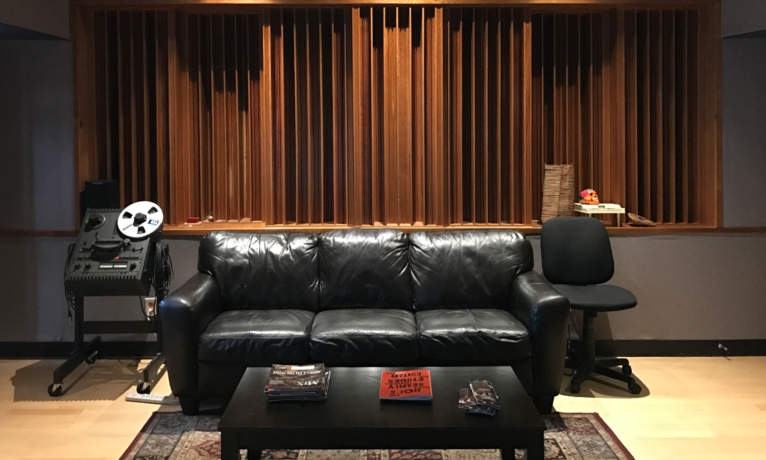 Control room diffusers with mandatory black leather couch