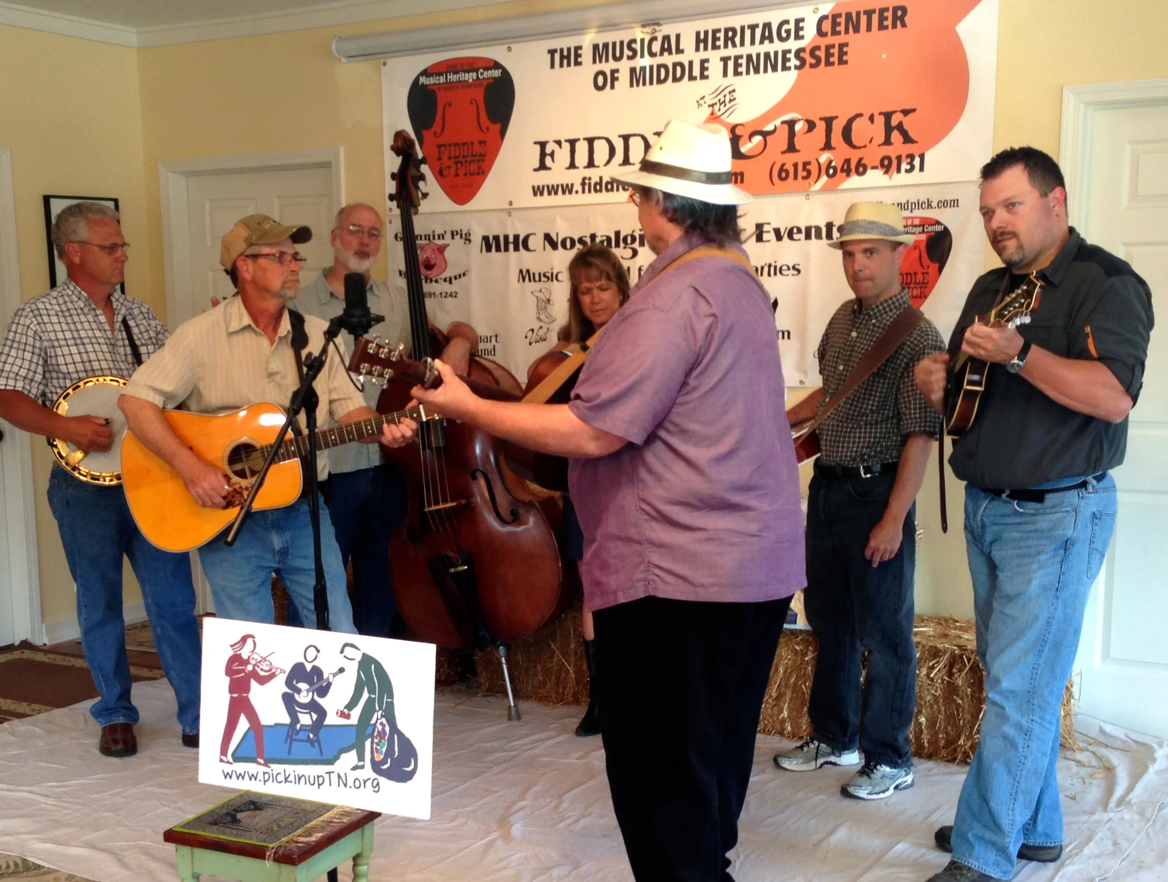 Pickin' Up Tennessee's music didn't get any better than this: (L to R): Wade Dawson, David Spicer, Bill Baldock, Gretchen Priest-May, Tom “Tree” Reynolds, Tim May and David Martin performed Stephen Foster's 19th century ballad "Angelina Baker" at Fiddle & Pick in Pegram.