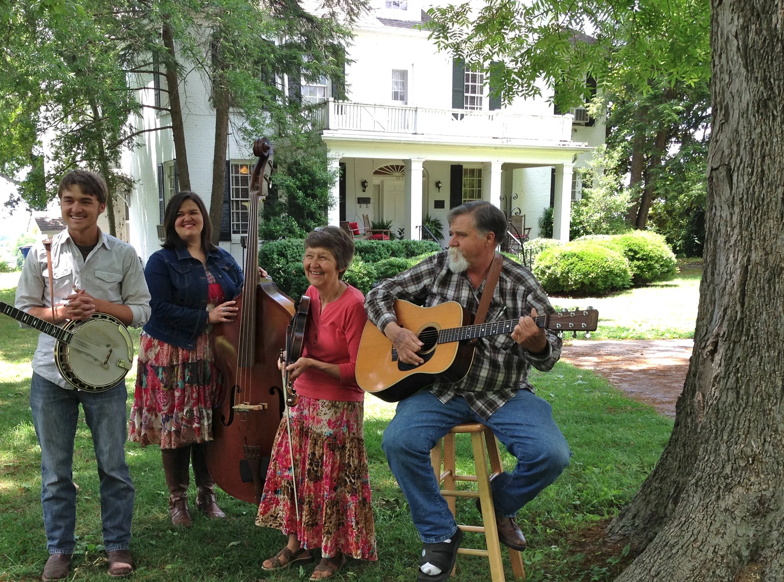 The Holt Family—Daniel Ray, sister Melody, and parents Martha Lynn and Danny Ray Holt, performed on the broad, shady lawn of Savannah's antebellum Cherry Mansion overlooking the Tennessee River.